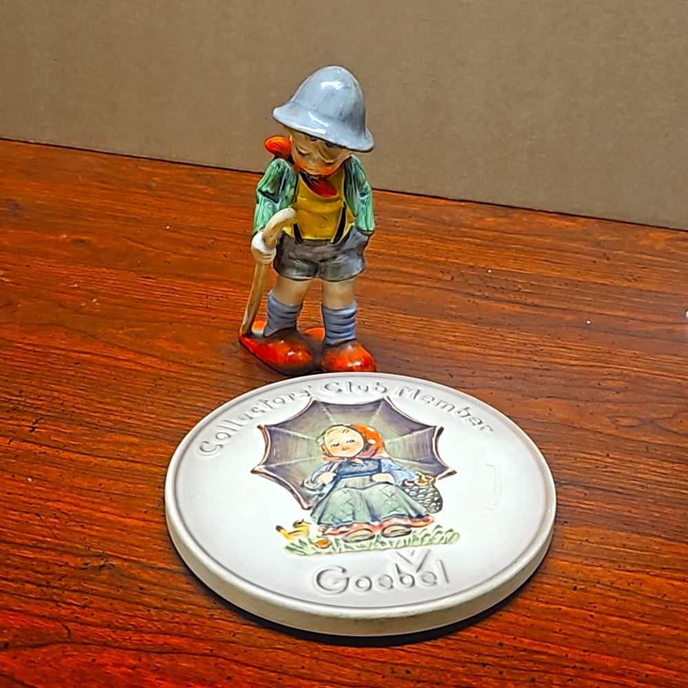 Little Dutch Boy traveling  and the Goebel Humme